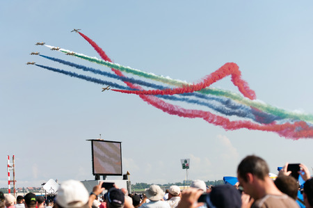 PAYERNE, SWITZERLAND - SEPTEMBER 6: Flight of Al Fursan aerobatic team from UAE in close formation on AIR14 airshow in Payerne, Switzerland on September 6, 2014のeditorial素材