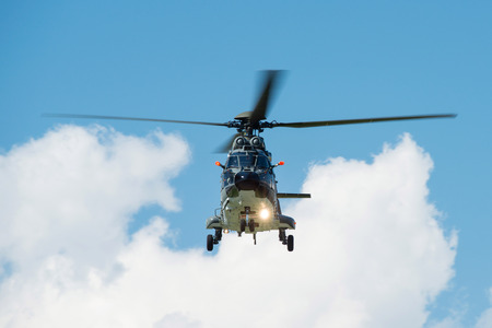 PAYERNE, SWITZERLAND - SEPTEMBER 6: Flight of Team Super Puma 2014 helicopter on AIR14 airshow in Payerne, Switzerland on September 6, 2014のeditorial素材