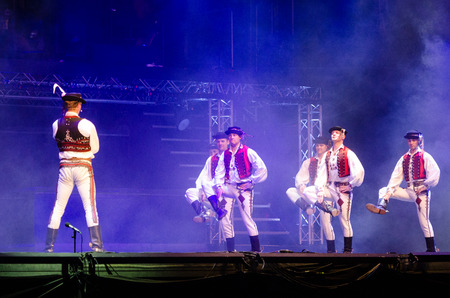 PIESTANY, SLOVAKIA - JUNE 28: Slovak music group IMT Smile featuring Slovak National Folklore Ballet Lucnica perform on music festival Topfest in Piestany, Slovakia on July 28, 2015のeditorial素材