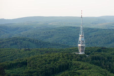 BRATISLAVA, SLOVAKIA - MAY 8: Aerial view of Kamzik TV transmission tower surrounded by forests in...