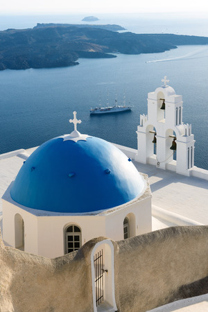 Detail of Agios Theodori church dome and belltower at sunset, Firostefani, Santorini, Greeceの写真素材