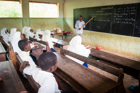 KENDWA, ZANZIBAR - JAN 10, 2018: Students in a classroom during English lesson, Primary school at Kendwa, Zanzibarのeditorial素材