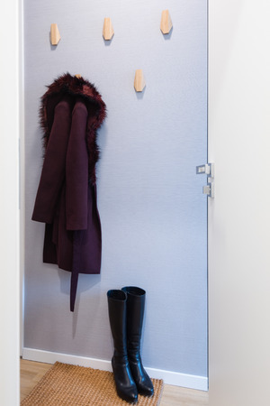 BRATISLAVA, SLOVAKIA - DEC 17, 2018: Hallway of small apartment created by young interior designers from Kivvi architects based in Bratislava, Slovakiaの写真素材