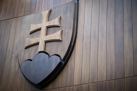 BRATISLAVA, SLOVAKIA - SEP1, 2019: Wooden coat of arms sign of Slovakia in Parliament building in...