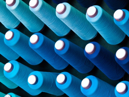 The colorful of the cone threads from textile factory
