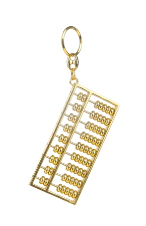 A golden key chain in shape of abacusの写真素材