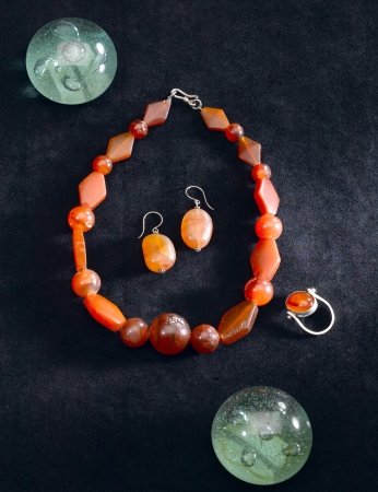 gemstone bead necklace with earrings and ringの写真素材