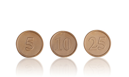 plastic coins toy isolated on white background