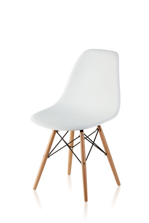 modern chair with wooden legs isolated on white backgroundの写真素材