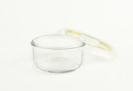 Glass food container with plastic lid on white backgroundの写真素材