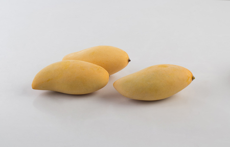 Fresh mango isolated on white backgroundの写真素材