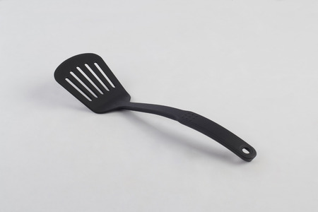 A turner, tool for cooking isolated on white backgroundの写真素材