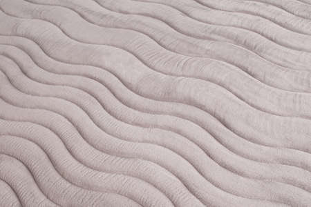 closeup of pattern on the gray mattress, texture surface as backgroundの写真素材