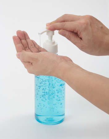 Close up woman using alcohol hand gel, Covid 19 protectionの写真素材