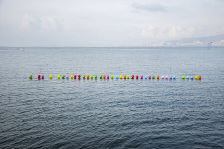 Balloon shooting game at sea. long shot Writing area. Background.