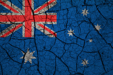 Dry soil pattern on the flag of Australia. Country with drought concept. water problem. Dry cracked earth country.の写真素材