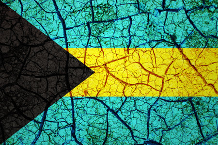 Dry soil pattern on the flag of The Bahamas. Country with drought concept. water problem. Dry cracked earth country.の写真素材