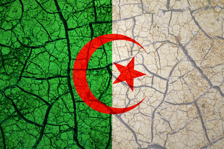 Dry soil pattern on the flag of Algeria. Country with drought concept. water problem. Dry cracked earth country.の写真素材