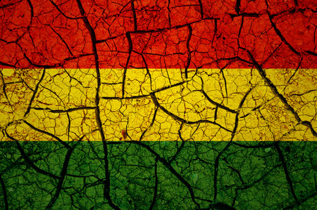 Dry soil pattern on the flag of Bolivia. Country with drought concept. water problem. Dry cracked earth country.の写真素材