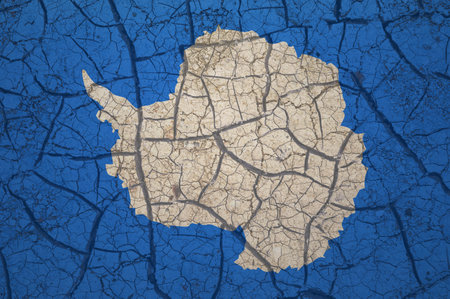 Dry soil pattern on the flag of Antarctica. Country with drought concept. water problem. Dry cracked earth.の写真素材