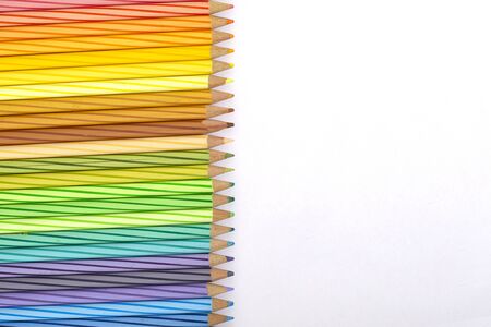 Colour pencils isolated on white background. left side close upの写真素材