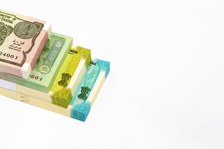 Indian Rupees Roll or Bundle. one,five,twenty,hundred rupees note isolate on white backgroundの写真素材