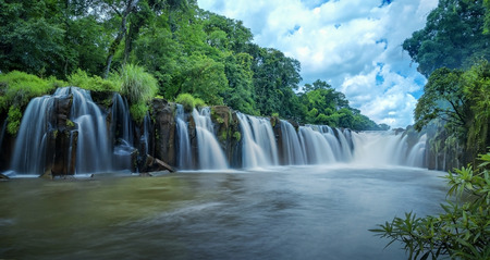 Mountain with waterfall cascades in Laos.の写真素材