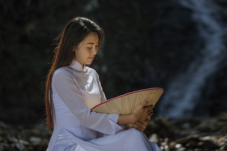 Ao dai is famous traditional costume for woman in VIetnam.の写真素材