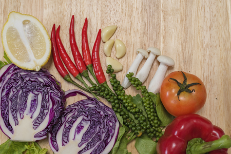 Healthy eating food, different fruits and vegetables on old wooden table background.の写真素材