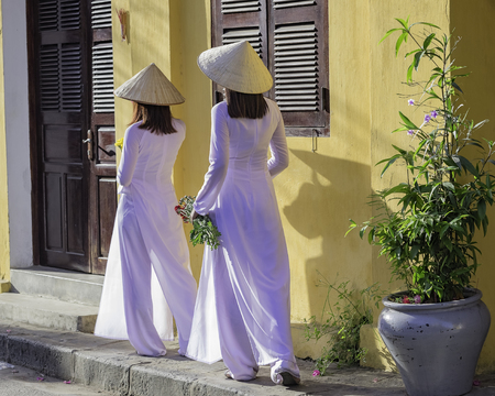 Ao dai is famous traditional costume for woman in VIetnam.の写真素材