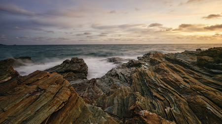 Colorful sunset over the rocky coast.の写真素材