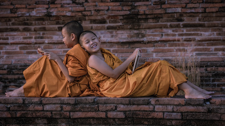 Novice monk learning in the Thailand.の写真素材