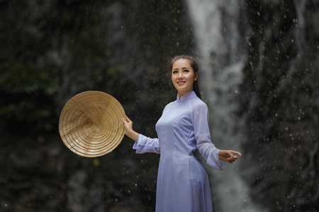Ao dai is famous traditional costume for woman in VIetnam.の写真素材