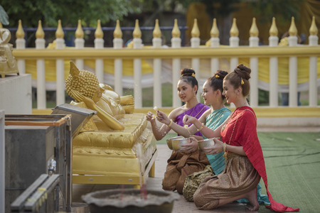 festival Songkran, Thai girls and laos girls splashing water during festival Songkran festival,Water blessing ceremony of adults.のeditorial素材
