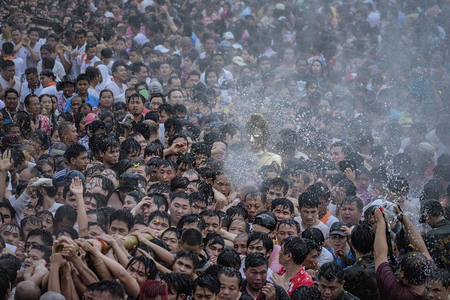 Buddha statue water ceremony in songkran festival 2017,THAILAND APRIL 13 , 2017, Many people have raised the buddha statues Luang Phor Phra Sai joined parade to pray closely at Nong Khai Thailand.のeditorial素材