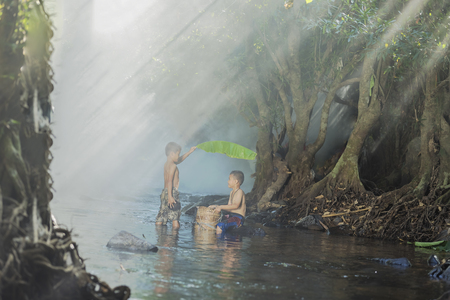 Portrait of Asian boy in outdoors.の写真素材
