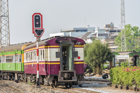train station with a train about to leave while the next train waits to come in.のeditorial素材