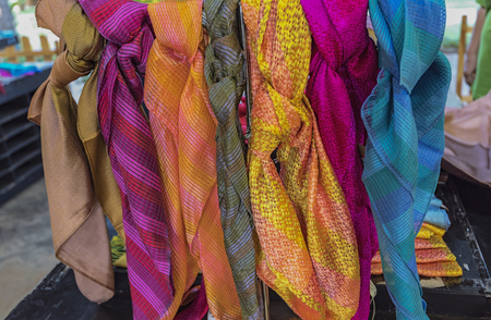 Multicolored scarf,Colorful scarves at an outdoor marketの写真素材