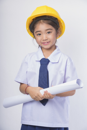 Young architects Project works on a new startup project in the modern workplace,a beautiful young woman architect works in the  workplace,working with partner and engineering tools.の写真素材