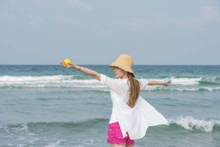 cheerful girl on the beachの写真素材