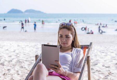 Selfie girl at the beachの写真素材
