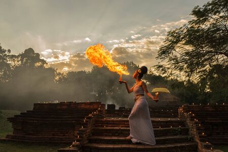 The throws light of the girl,Show flame, girl, throws light show.の写真素材