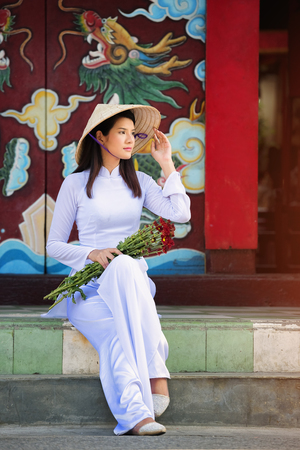 Beautiful woman with vintage style ,Beautiful woman with Vietnam culture traditional,Hoi an,Life of Vietnamese の写真素材