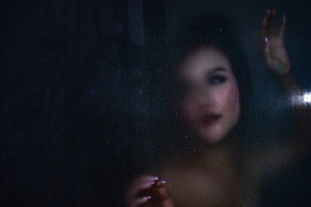 Ghost in the house, ghost in bathroom, mystical and fantasy style, blur picture, scary and mysterious, fantasy story woman in bathroom.の写真素材