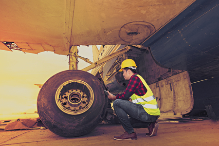 Old aircraft engine,Inside airplane wreckage,Airline safety engineer going through a pre-flight checklist by Flight engineer,useful for plane safety, pilot, flights, air craft.の写真素材