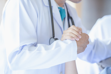 Health check,Doctor with patient in hospital,Close up of a  doctor checking  health...