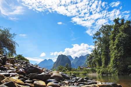The hills in the river landscape,majestic sunset in the mountains landscape,dramatic sky, Beauty world.の写真素材