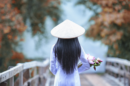 Beautiful woman with vintage style ,Beautiful girl with Vietnam culture traditional,Life of Vietnameseの写真素材