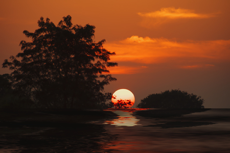 Beautiful Sunset in The River,Reflection of Sky and The Sun,The river with Nightfall Landscape,Majestic Sundown River View.の写真素材