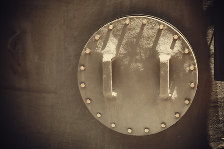 Opening tank lid. Large rain water tank in backyard.の写真素材